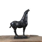 Unique hand-carved war horse sculpture with aged cracks and artisanal detail. A one-of-a-kind art piece that adds elegance and character to any space.